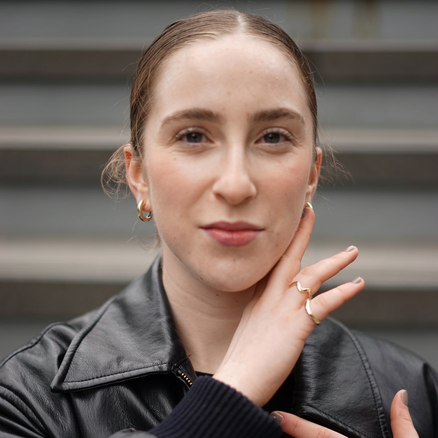 Ripple Ring worn on a model's hand