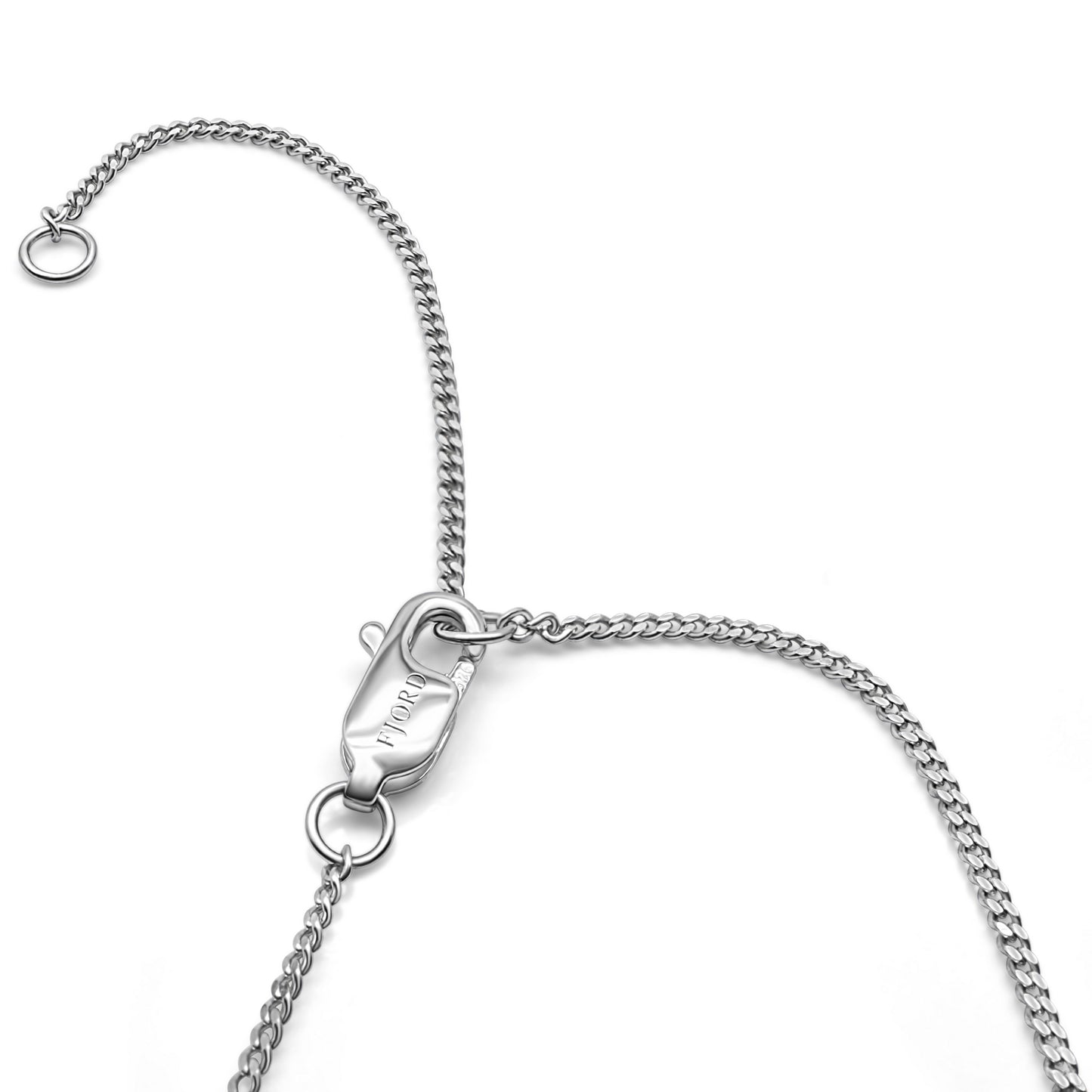 Slim sterling silver curb chain necklace featuring a lobster clasp with the Fjord logo tag and a 2-inch extender chain.
