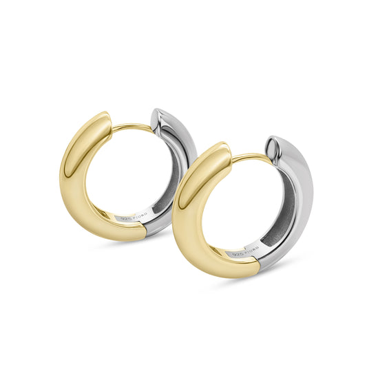 Two tone 14K gold and silver hoop earrings on a white background