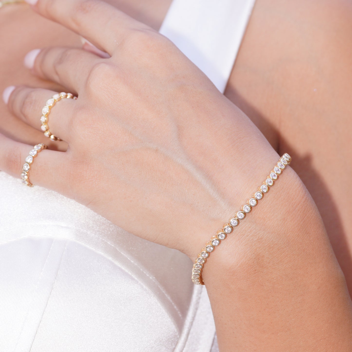 Tennis bracelet with sparkling cubic zirconia, sterling silver base, 14k gold vermeil finish