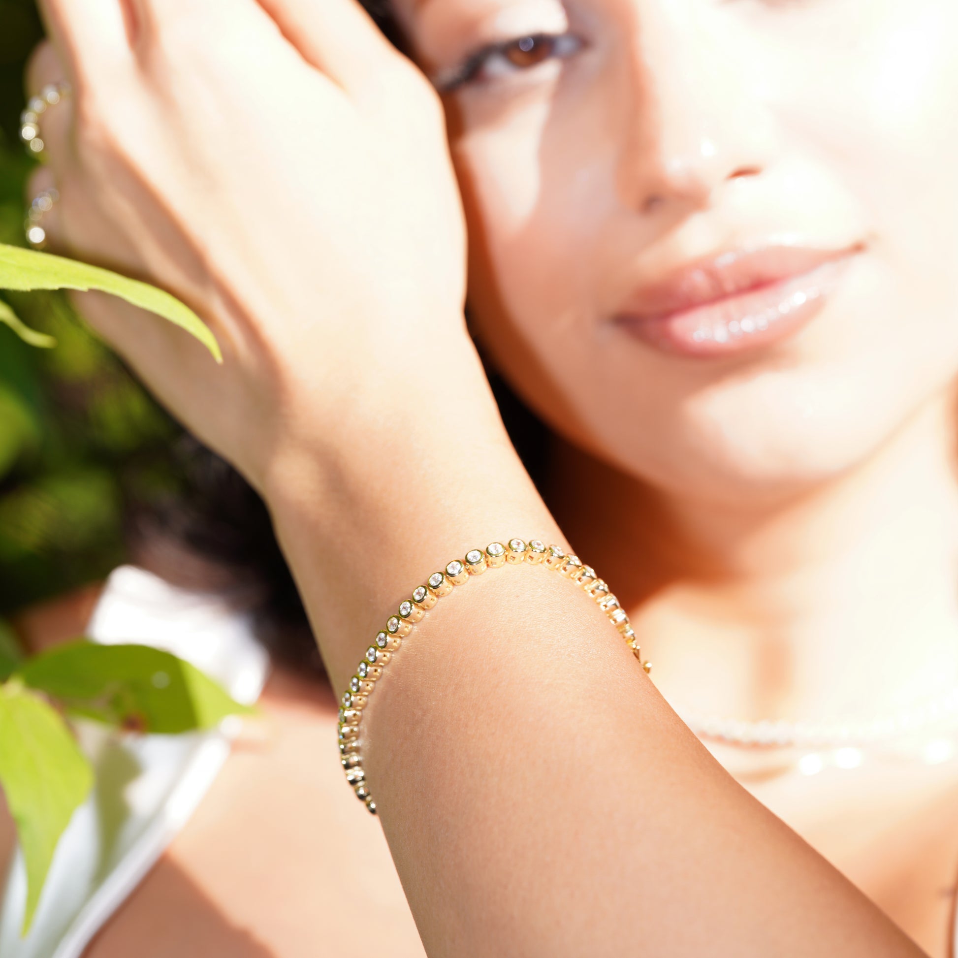 Tennis bracelet with sparkling cubic zirconia, sterling silver base, 14k gold vermeil finish