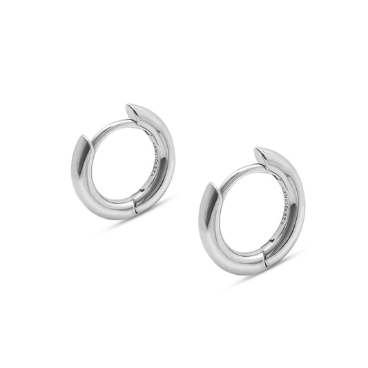Pair of silver hoop earrings on a white background