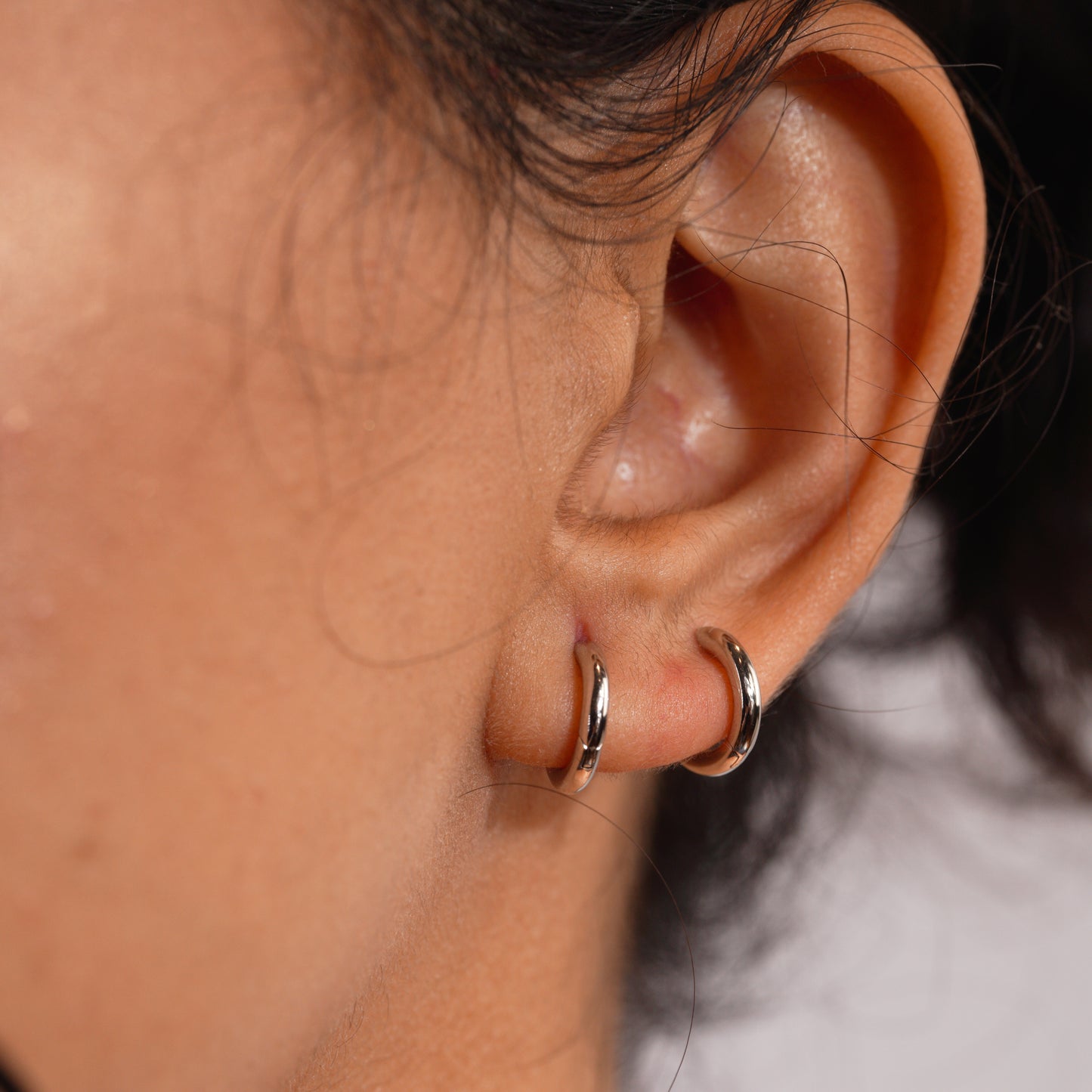 Essence Hoops | Huggie Hoop Earrings in Rhodium-Plated Sterling Silver