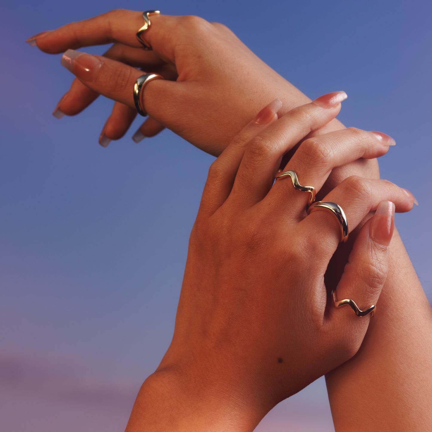 Ripple Ring worn on a model's hand