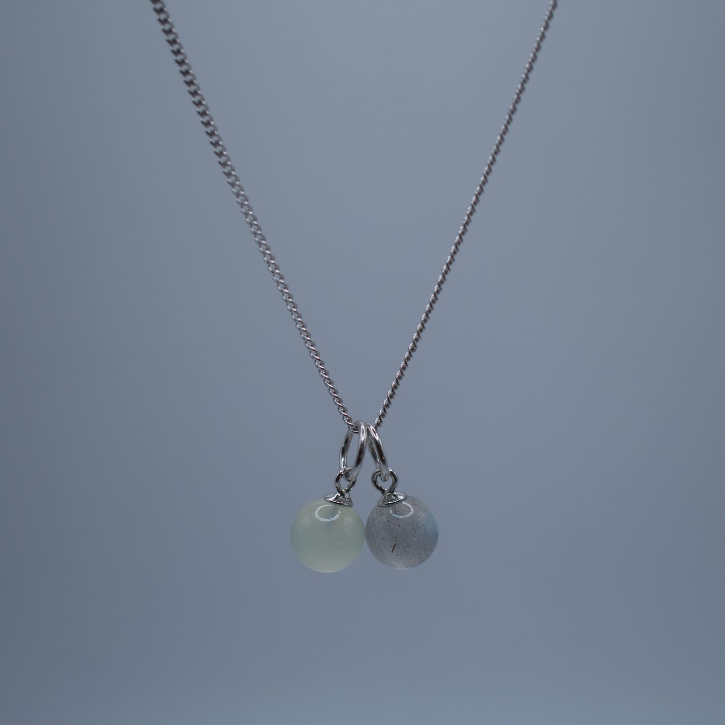 Necklace with prehnite charm and Labradorite Charm on silver curb chain
