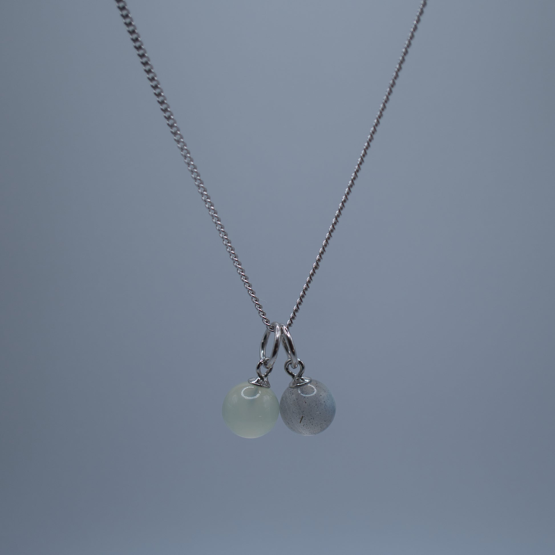 Necklace with prehnite charm and Labradorite Charm on silver curb chain