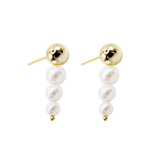 Close-up showing three freshwater pearls